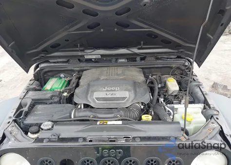 2014 Jeep Wrangler Unlimited Willys Wheeler из США, поврежденный, VIN 1C4BJWDG6EL293893